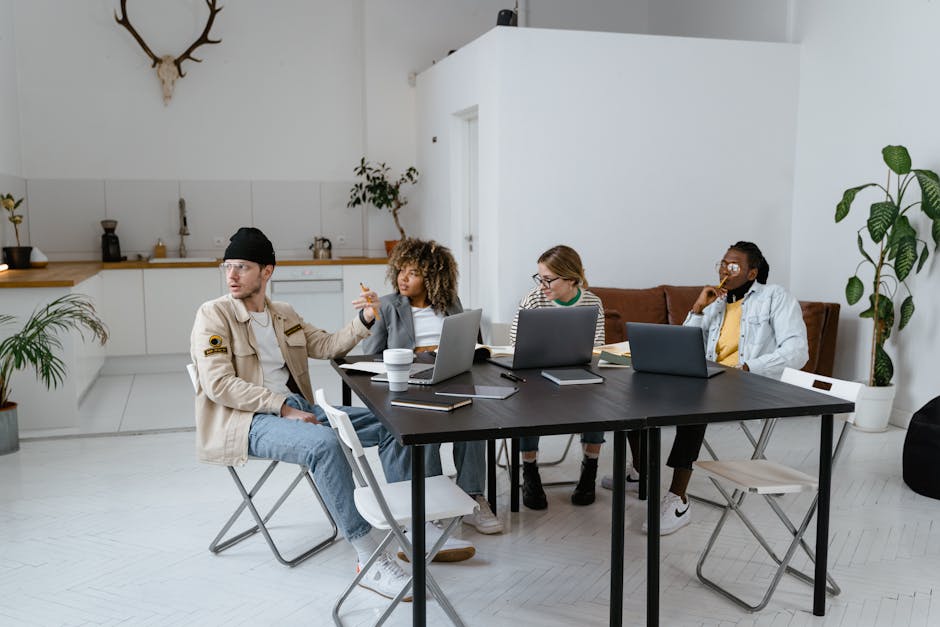 A diverse group of professionals collaborating in a modern and stylish office setting